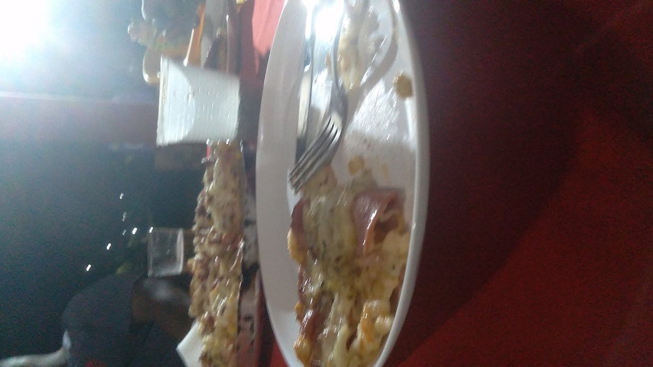 Full pizza on a serving board at Fat Clemenza&rsquo;s Italian restaurant in Miramar Beach Florida