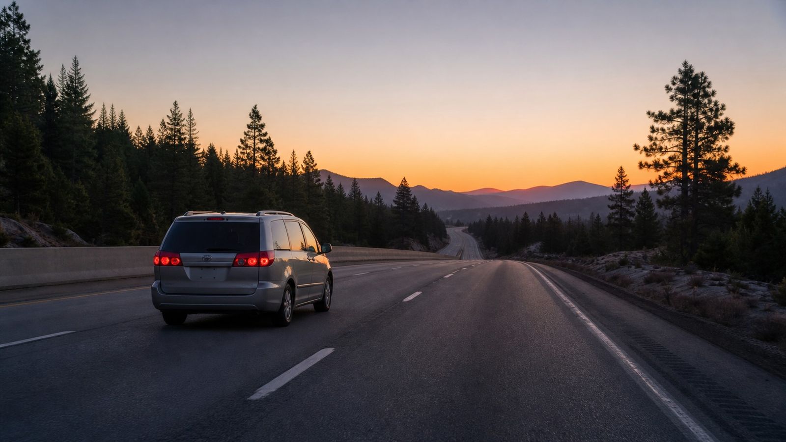 Family minivan on an empty Alabama interstate at dawn, an early start being the best strategy for driving from Huntsville to Destin without traffic
